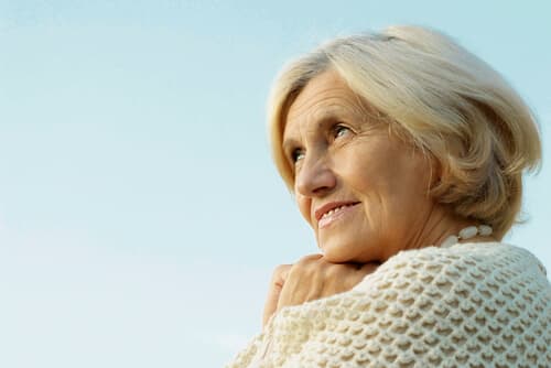 Older woman smiling after cataract surgery