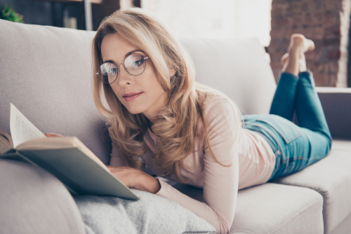 Woman reading with eyeglasses