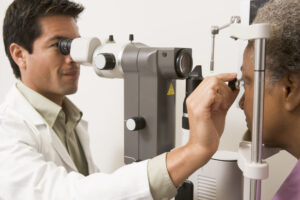 man giving eye exam