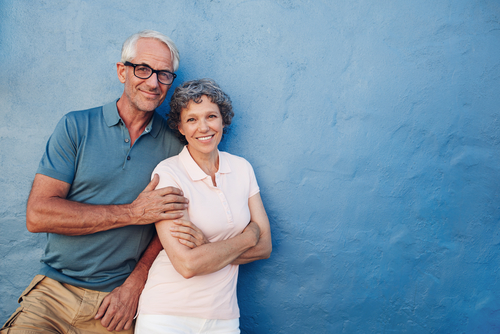 Older couple smiling after cataract surgery