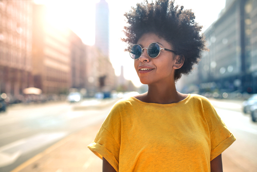 head shot of woman wearing sunglasses