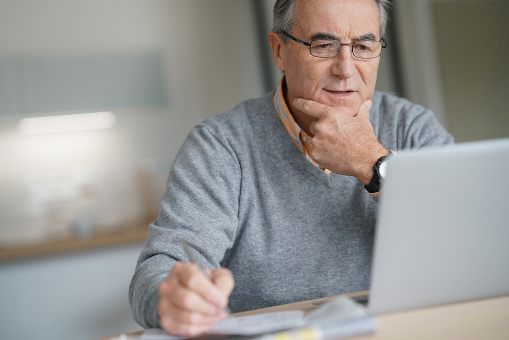 man using laptop 