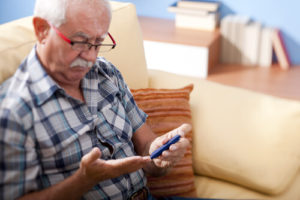 Older man with diabetic retinopathy