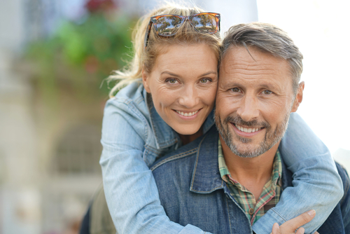 Older couple smiling after cataract surgery