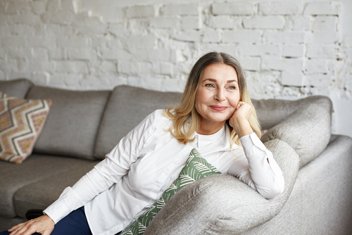 woman sitting on couch